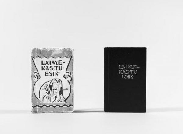 Two black and white book covers standing upright on a plain white background.